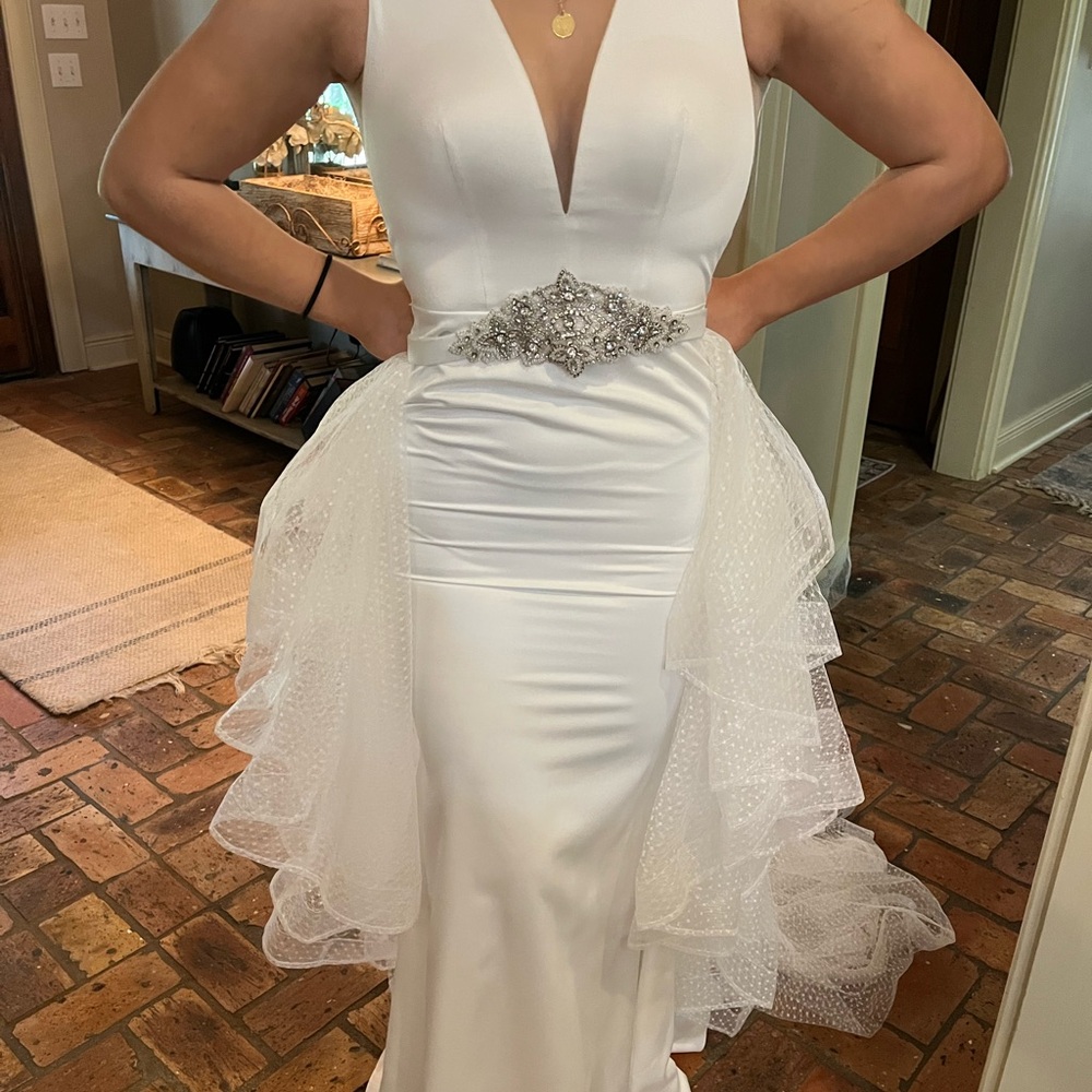 Elegant White Gown with Embellished Waist